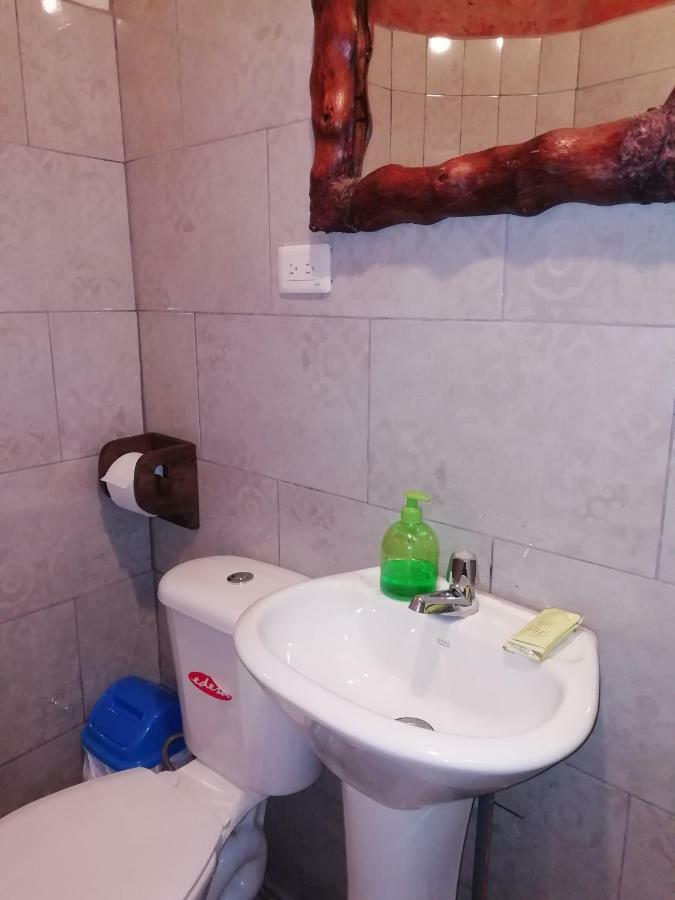 Hostal La Casa Amarilla City Baños Extérieur photo